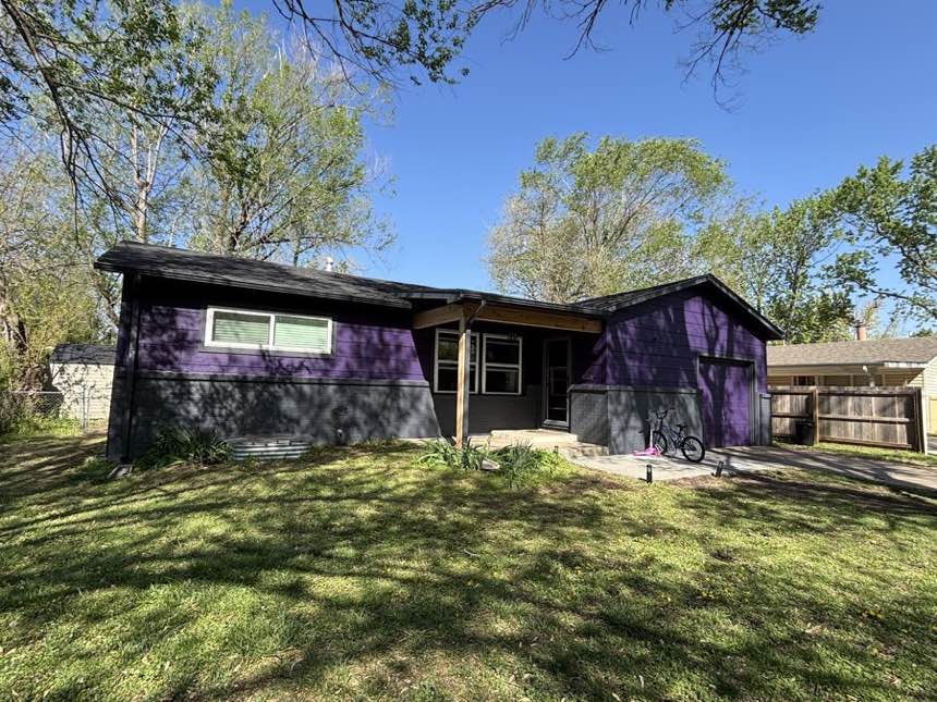 Single-story Wichita home with a freshly repainted exterior after roof and paint work